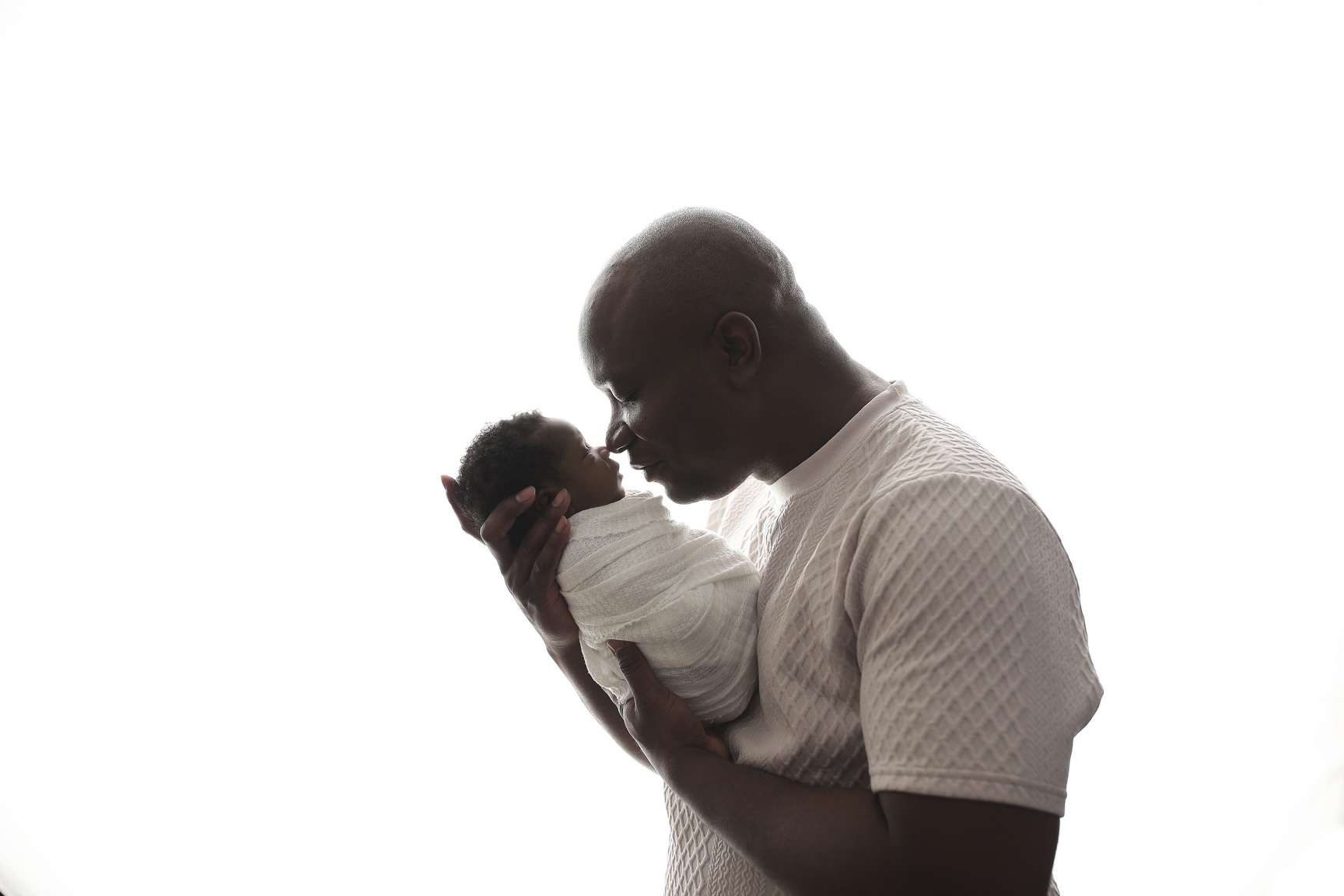 NYC newborn photoshoot of Daddy and Baby Boy